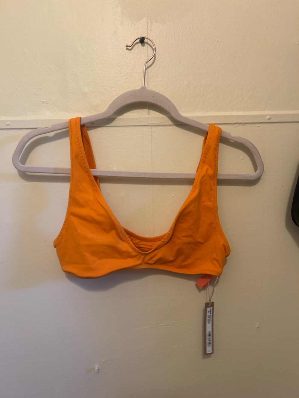 SKIMS tangerine top